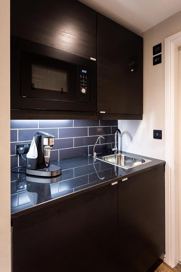 Kotel 윈더미어 외부 사진 A Nespresso coffee machine in a kitchen